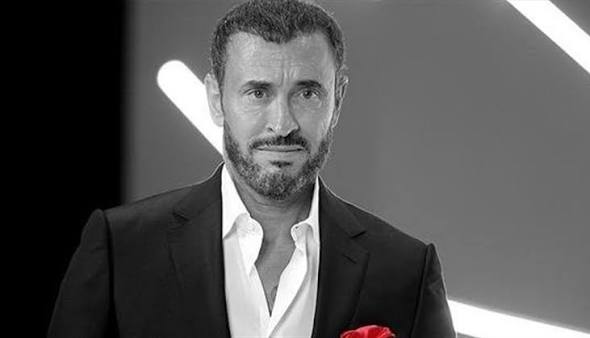 Illustrative stock portrait placeholder — replace with a licensed photo of Kazim Al Sahir