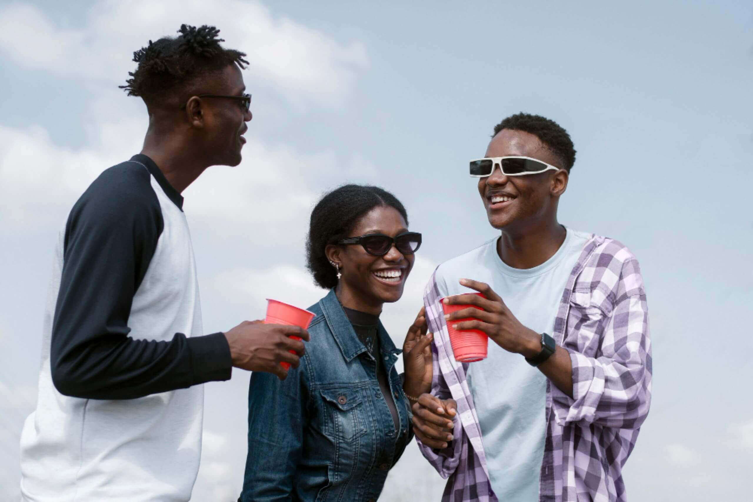 An image showing a group of young travelers socializing.