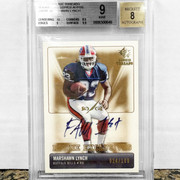 2007 SP Rookie Threads Marshawn Lynch /100 (Auto | BGS 9 | Inscribed “FAM 1st”)