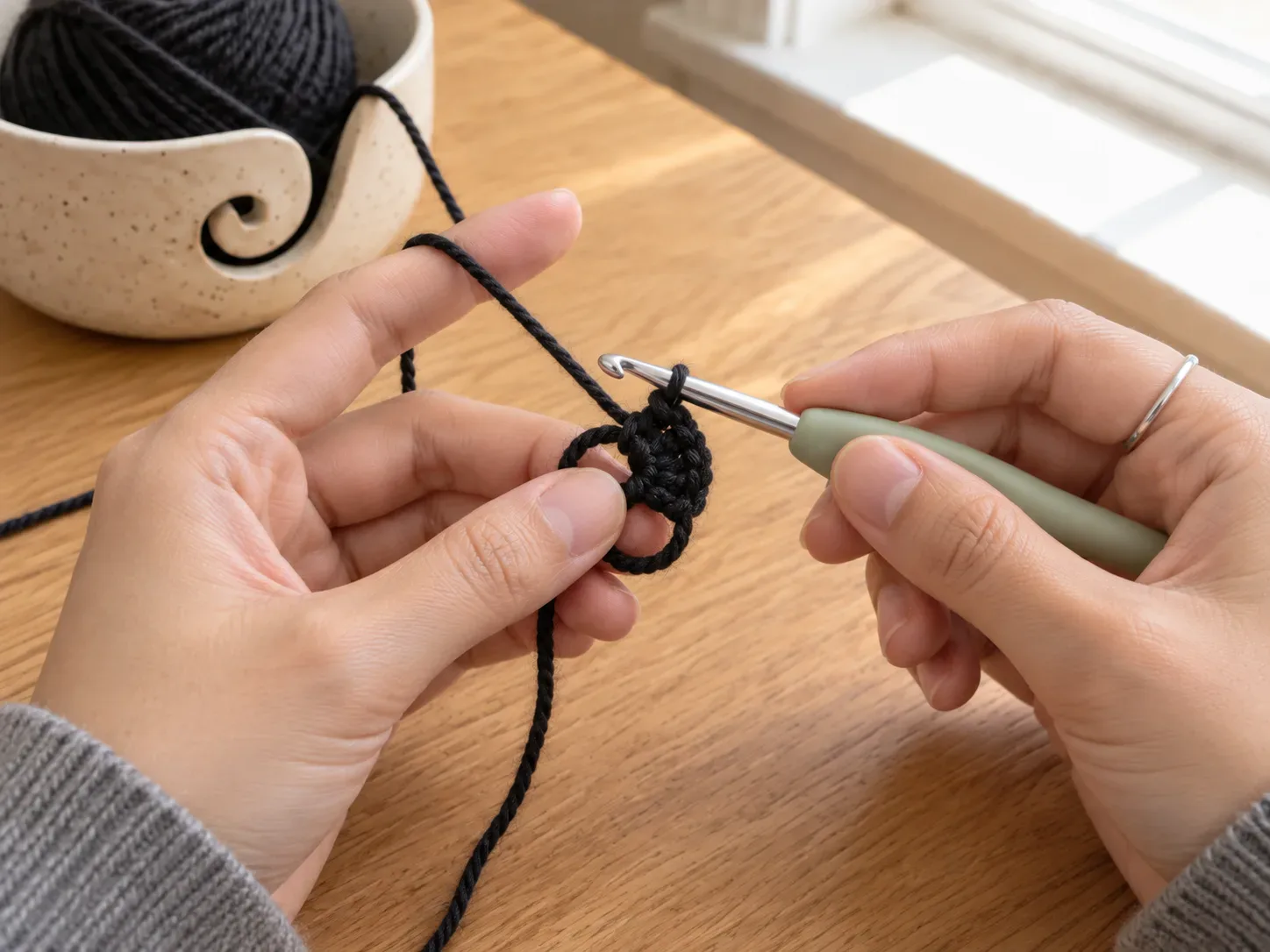 Start the head — Make a magic ring and begin the compact black cat head.