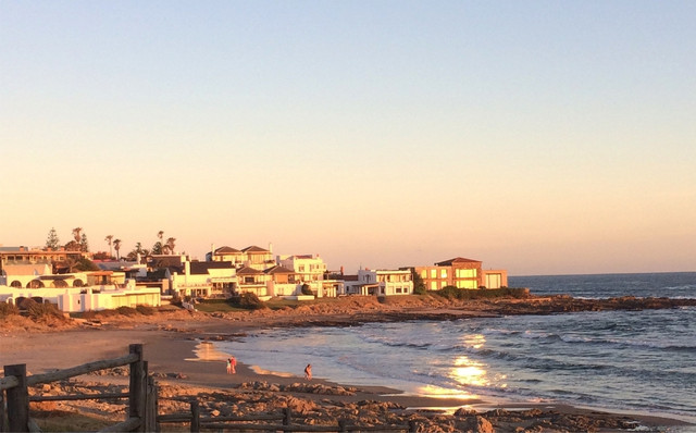 Aerial view of La Barra beach at sunset, Uruguay – a prime real estate location highlighting property investment opportunities in 2025 with La Cité Real Estate