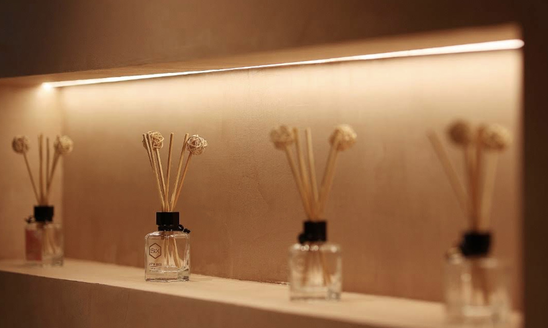 Signature fragrance bottles and scent workshop at Scent by SIX
