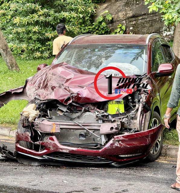 A car and a bus collide at a bend in Kadugannave.