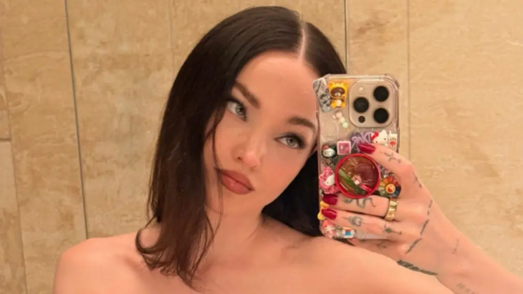 Dove Cameron Stuns in Elegant Strapless Gown