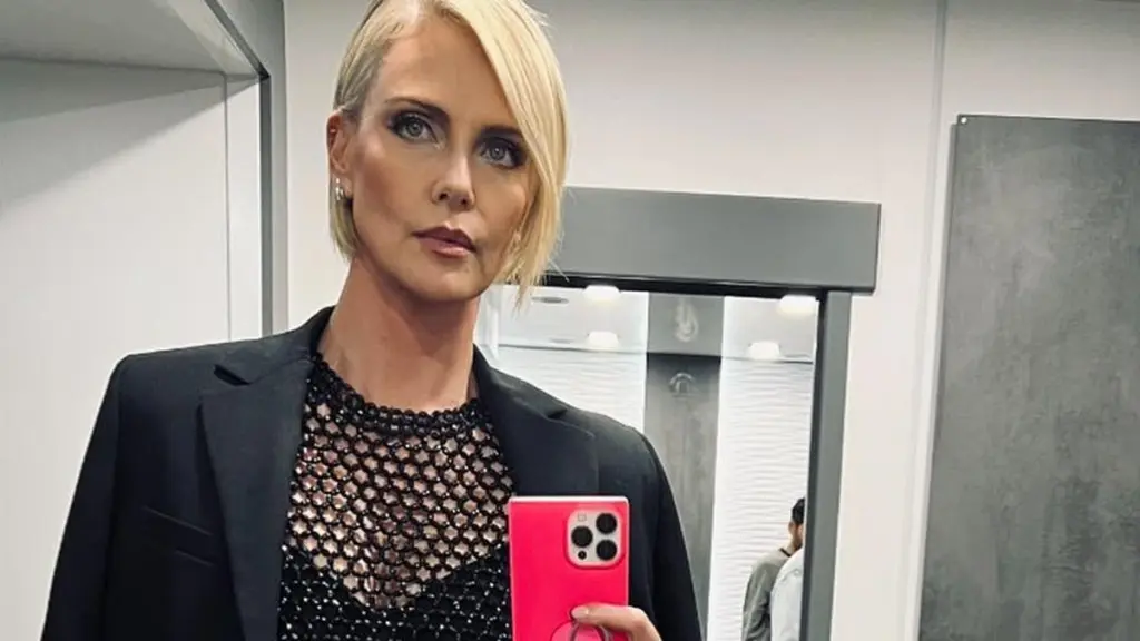 Charlize Theron's Striking Style at Paris Photo Call