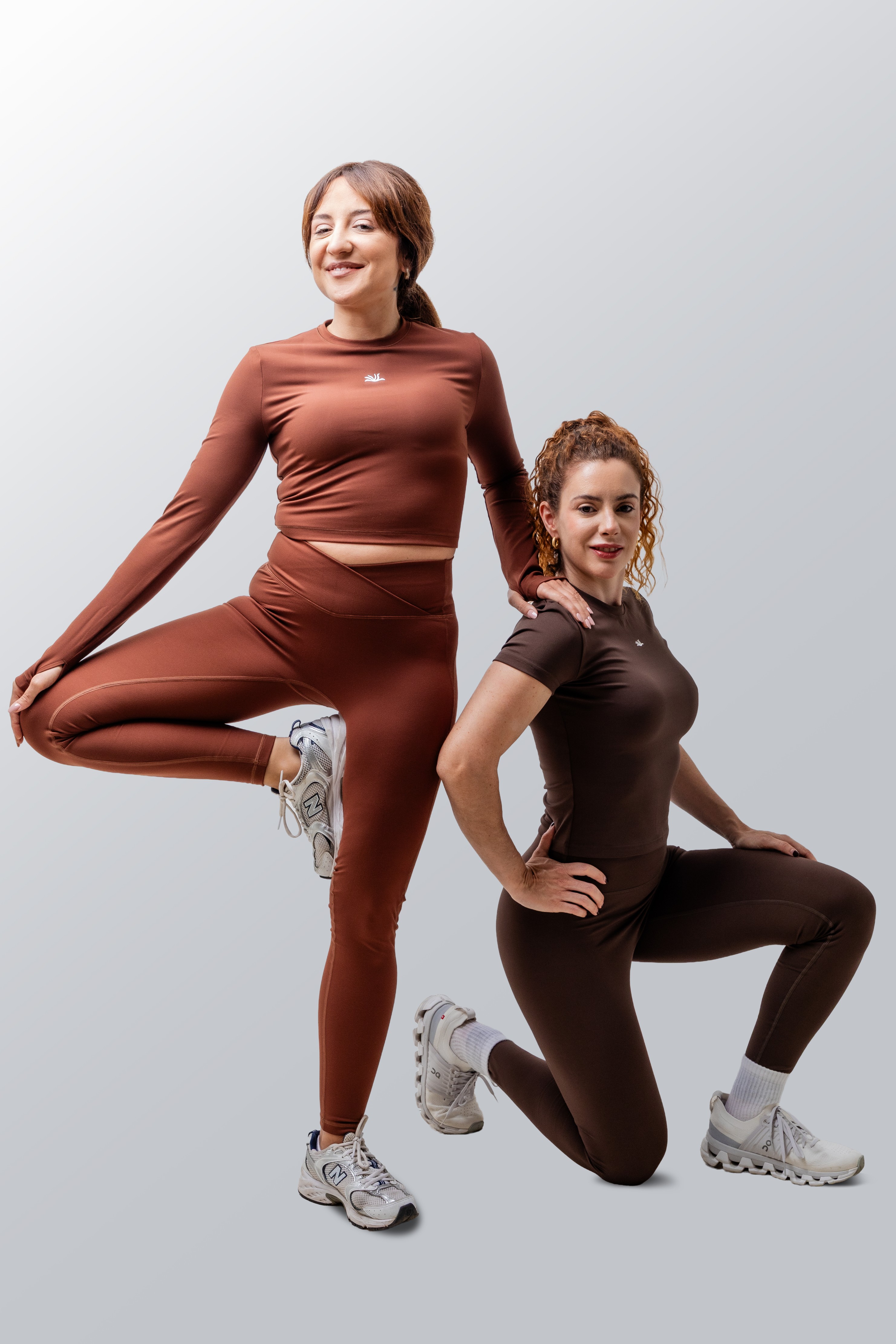 Two women in casual wear representing movement and wellness content.