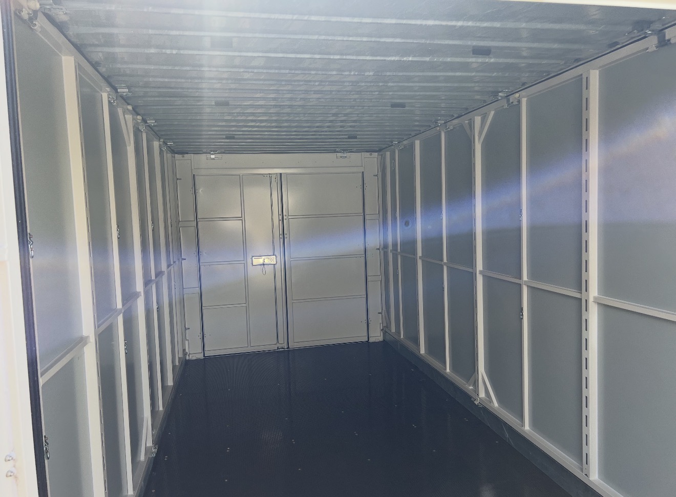Active Transport truck hauling a loaded storage pod across Washington state