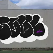 Graffiti artwork by Village