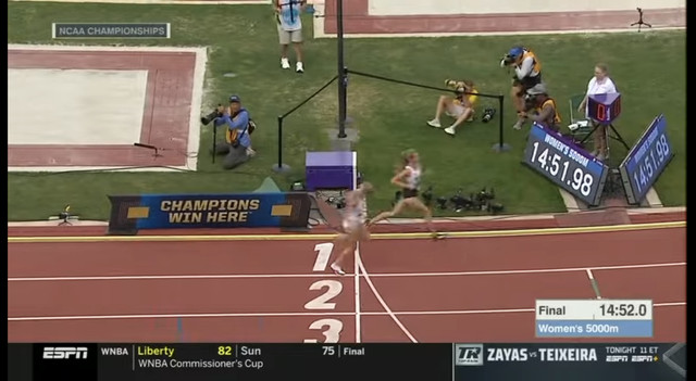 Timing clocks say 14:51.98 or 14:52.0 when Valby crosses the line.