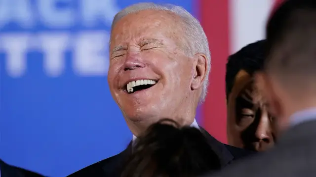 [Image: Joe-Biden-Laughs.webp]