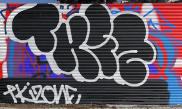 Graffiti artwork by Tkiz