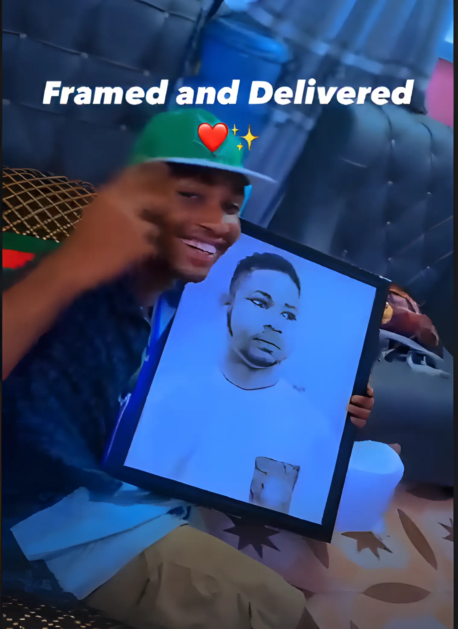 Client holding a completed custom pencil portrait