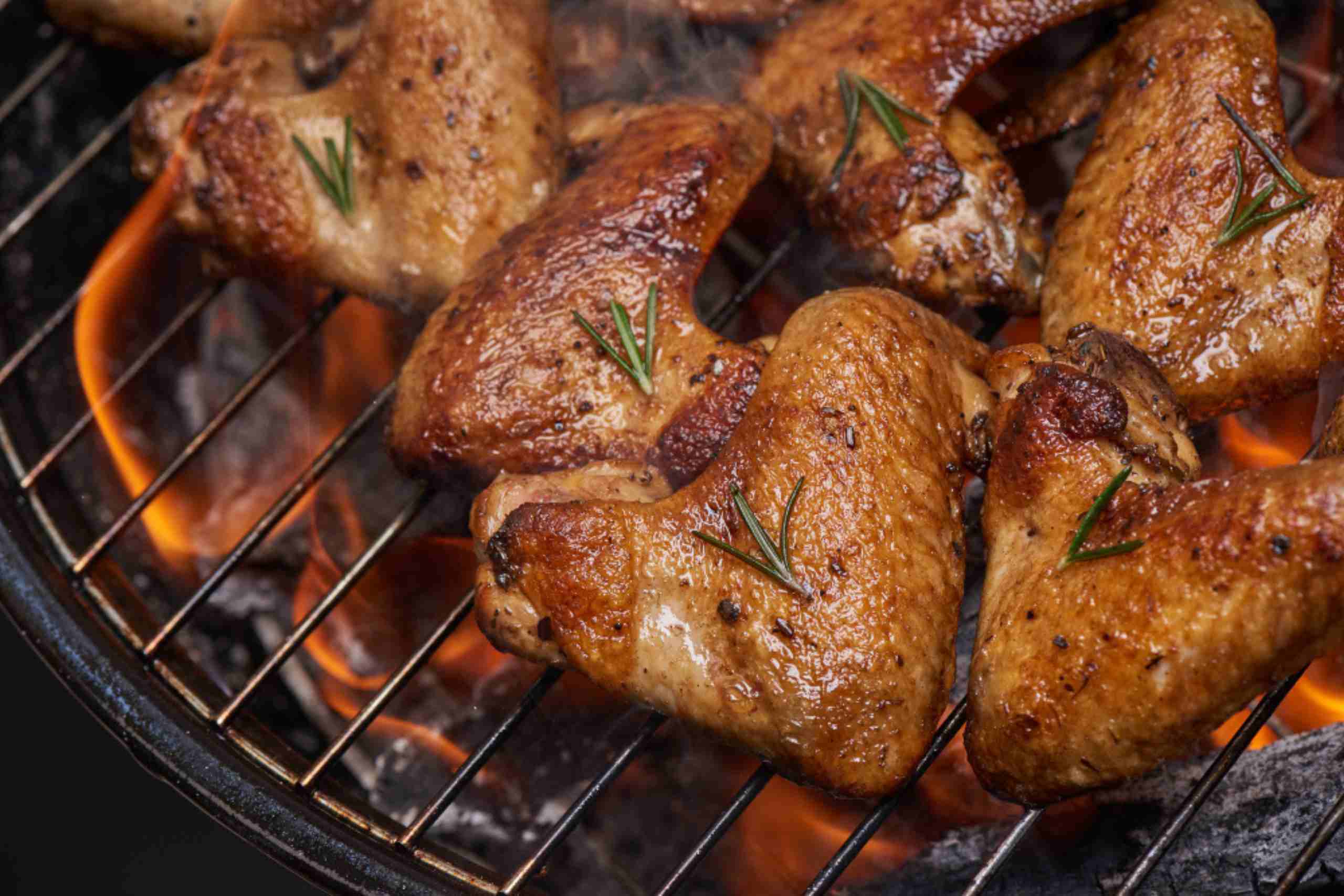 An image showing pieces of grilled chicken.
