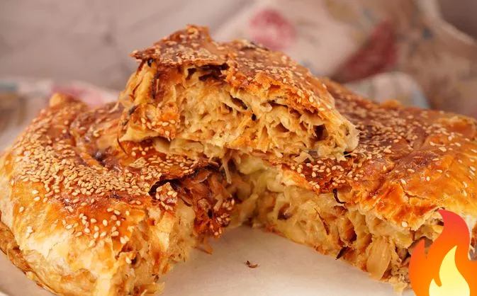 Фото Слоёная вертута с квашеной капустой и грибами