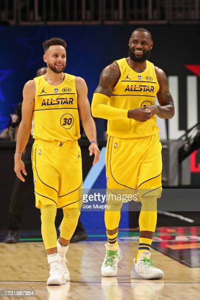 ATLANTA-GA-MARCH-7-Stephen-Curry-30-and-Le-Bron-James-23-of-Team-Le-Bron-smile-and-walk-up-court-dur.jpg