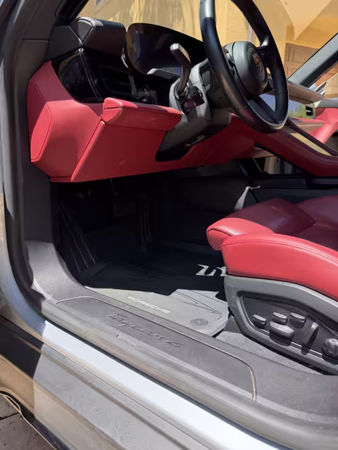 Porsche Taycan — red leather interior