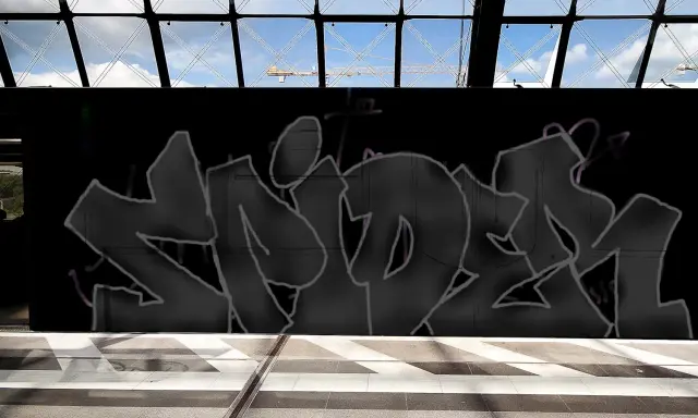 Graffiti artwork by Tkiz