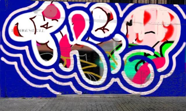 Graffiti artwork by Tkiz