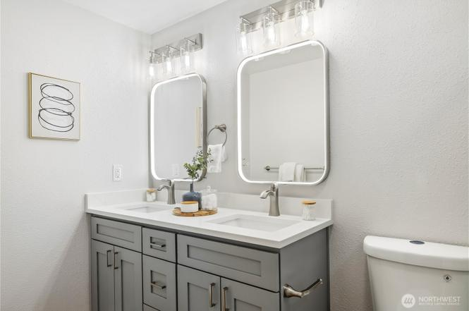 Walk-in tile shower and frameless glass