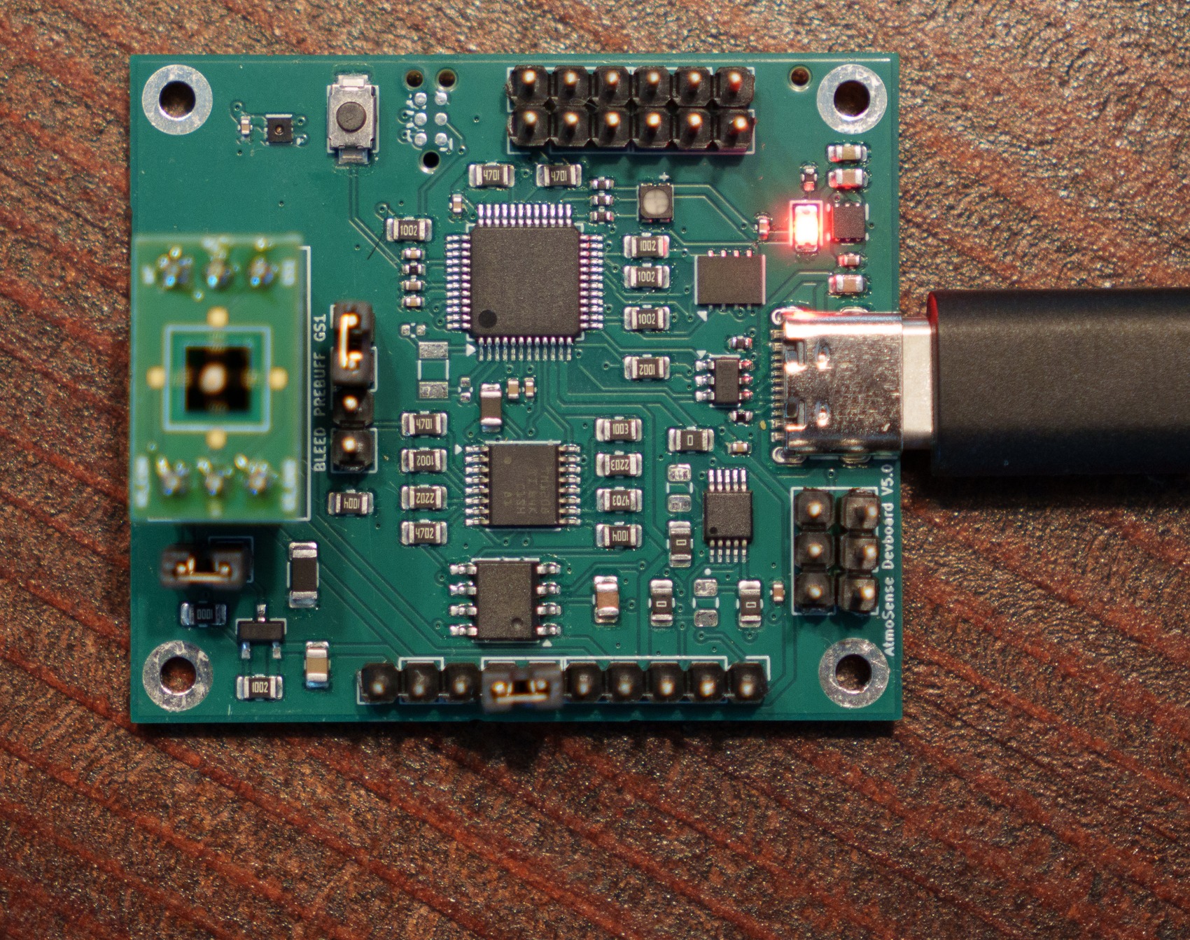 Assembled AtmoSense Devboard V5.0, powered over USB-C with the ozone sensor plugged in