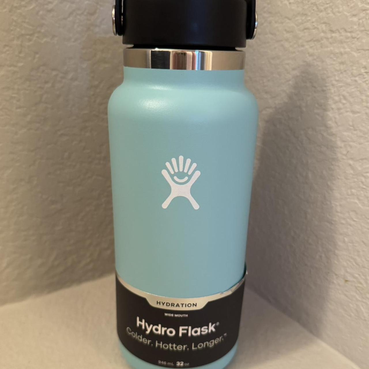 Blue Hydro Flask 32 oz insulated water bottle.