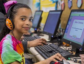 A school child in a computer facilitated language listening