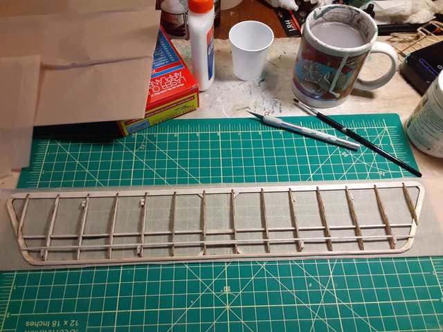 Place the framework on the tissue. Carefully turn it over and place it somewhere safe to dry.