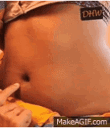 [Image: navel-poking.gif]