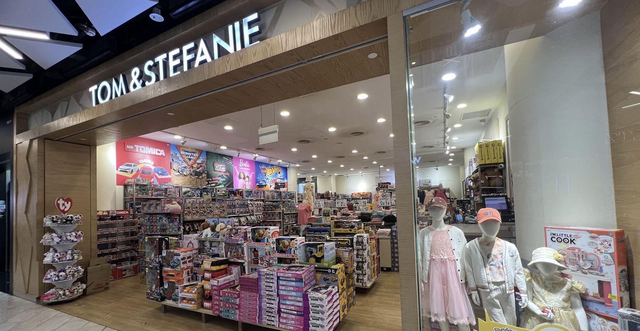 Children's clothing and gift-wrapped items at Tom and Stefanie PLQ Mall