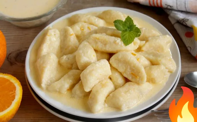 Постер Ленивые вареники с цедрой и сметанно-апельсиновым соусом