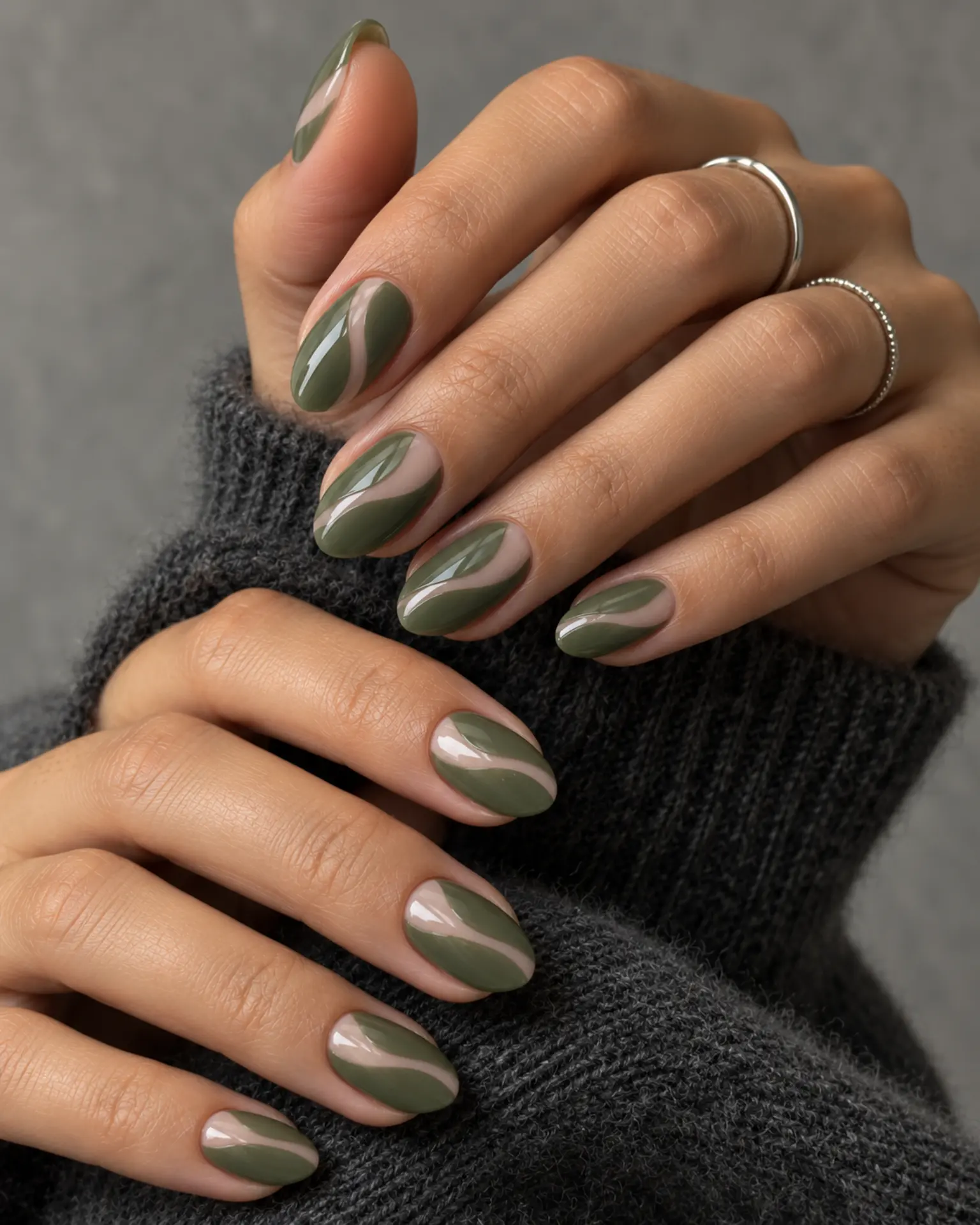 Green Negative-Space Curve manicure inspiration for green nail ideas