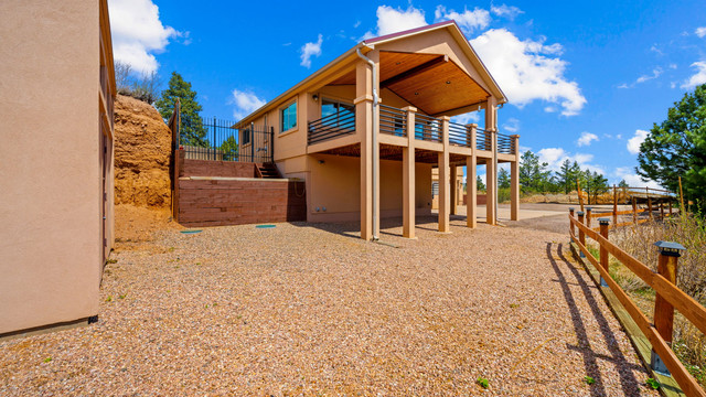Pikes Peak region home exterior with surrounding pines