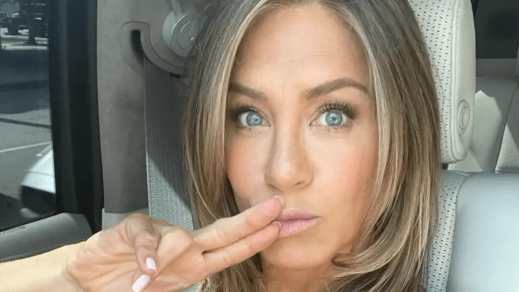 Jennifer Aniston's Chanel Swimsuit Stuns