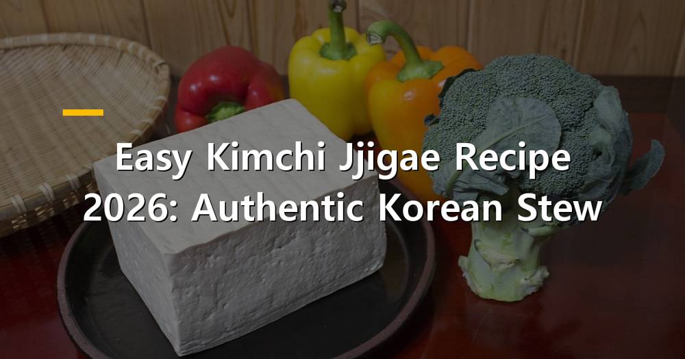 A steaming bowl of Kimchi Jjigae with rice and side dishes