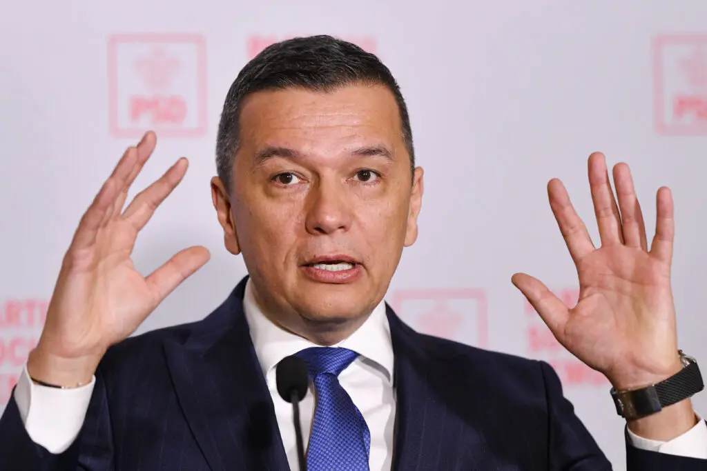 Bolojan e menținut în funcție cu voturile AUR