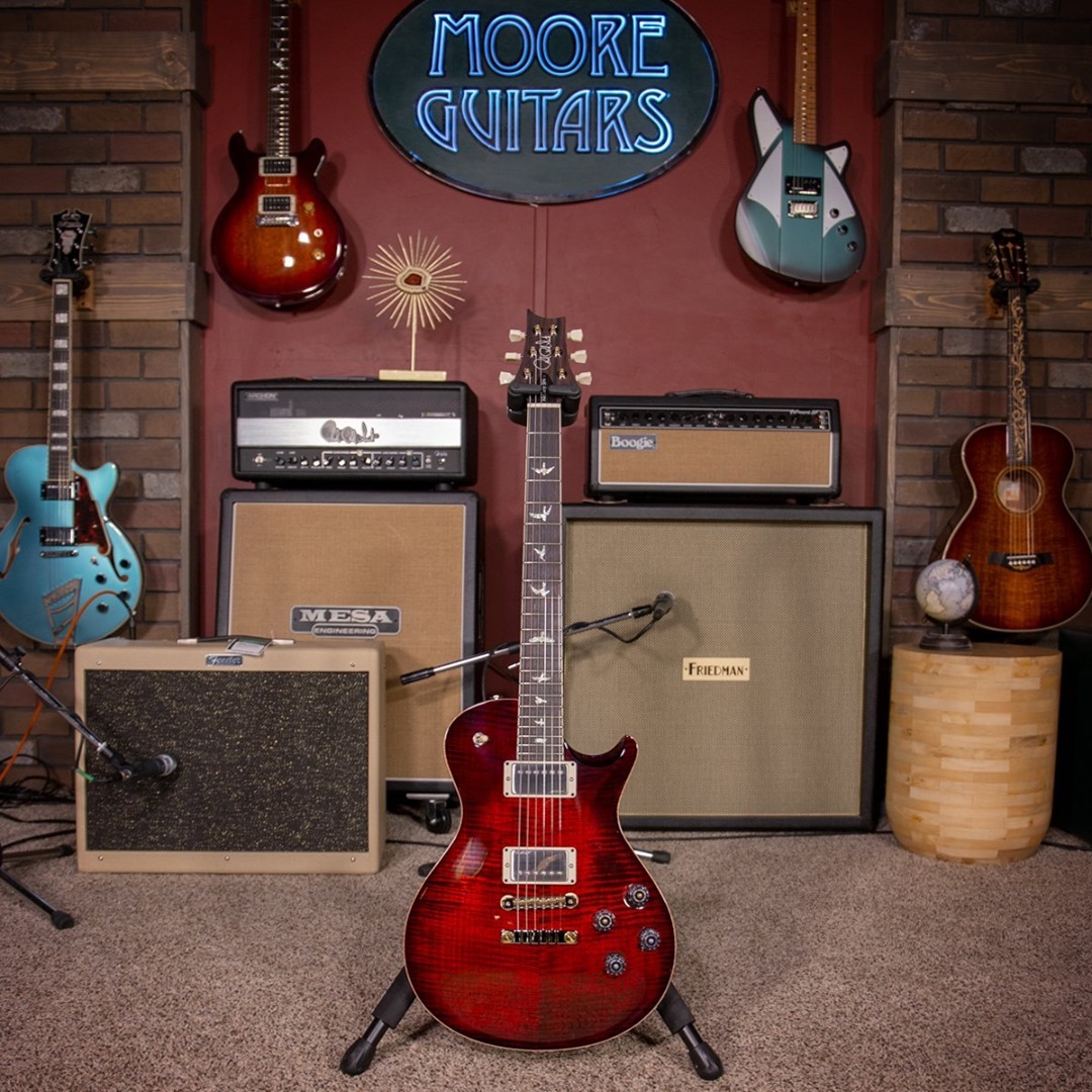 Moore Guitars 1 Moore Guitars is an online store that offers a wide range of guitars, basses, and music accessories.