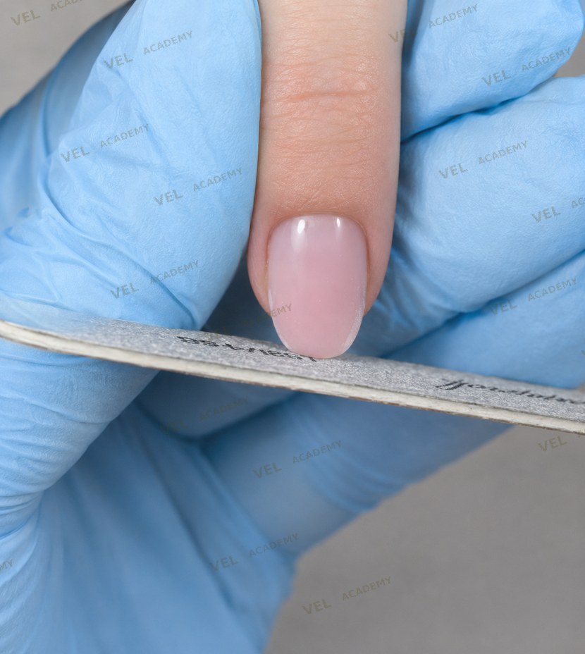 Checking and rounding center of oval nail shape rocking motion step 6