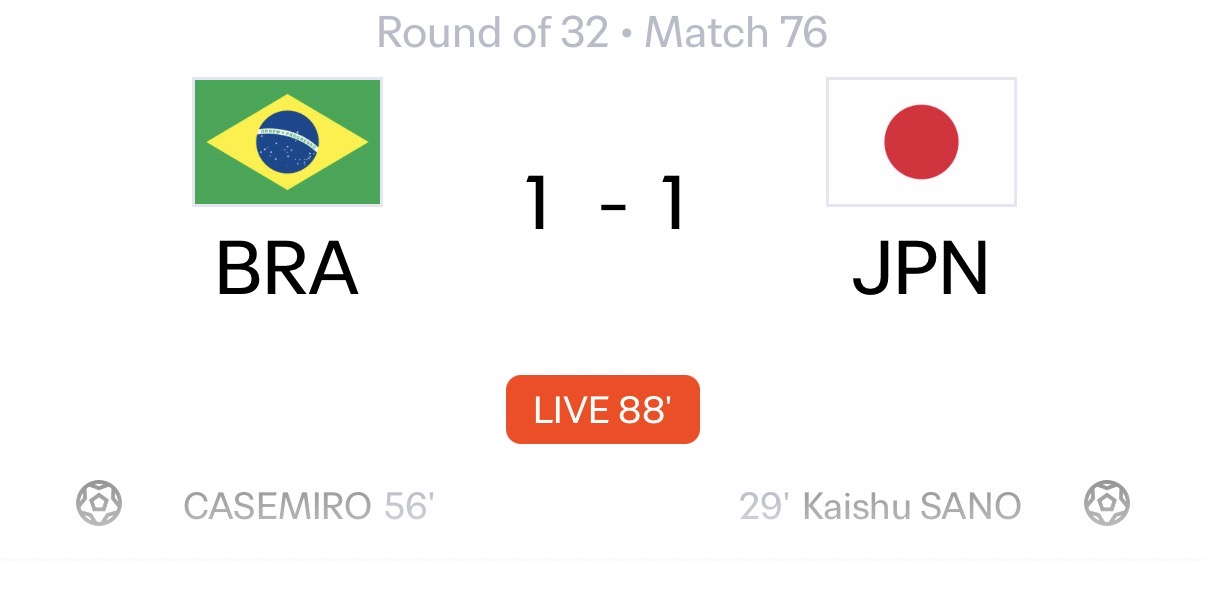 Brazil and Japan players battling for possession in the high-stakes final minutes at NRG Stadium.