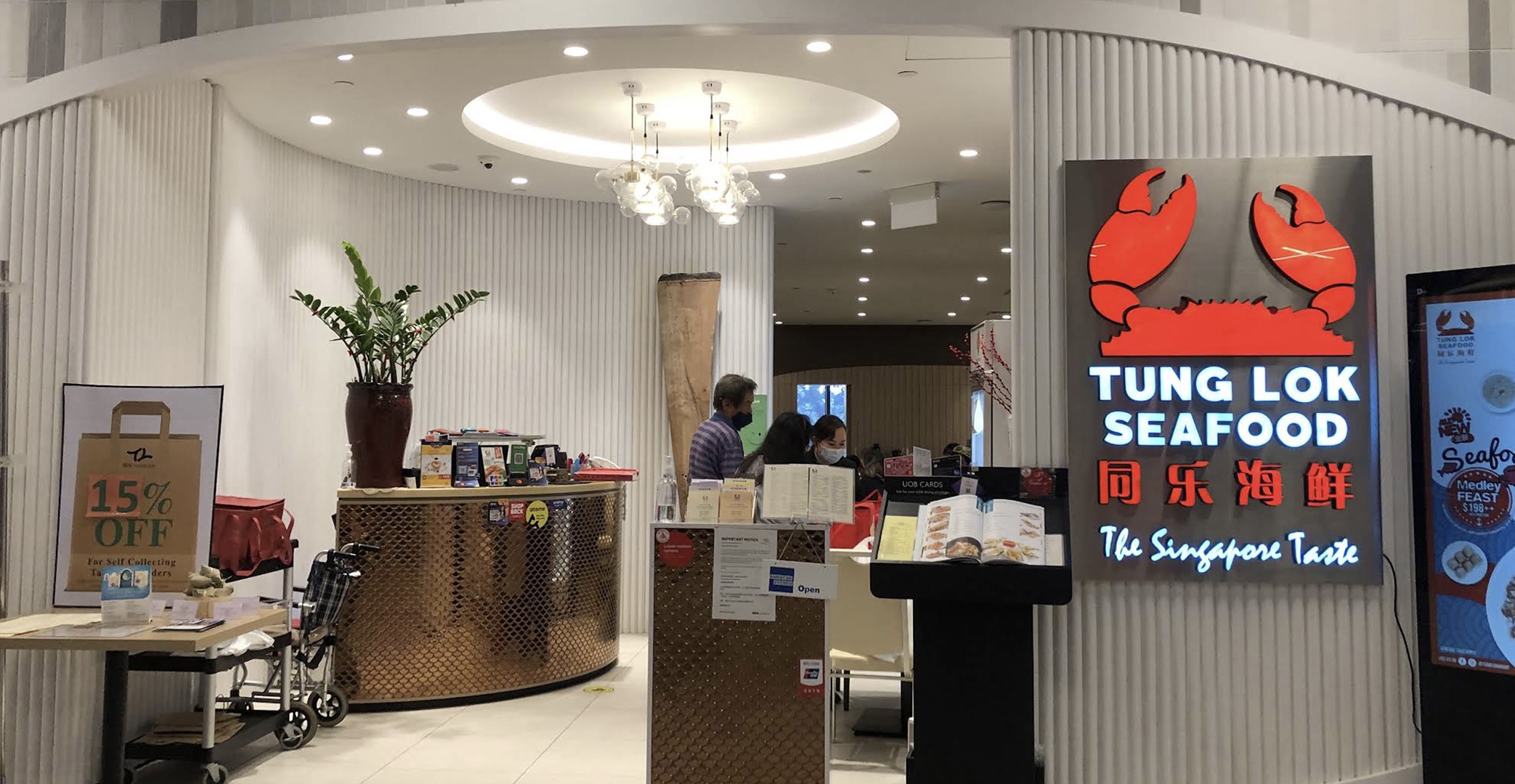 TungLok Seafood dining spread with multiple dishes
