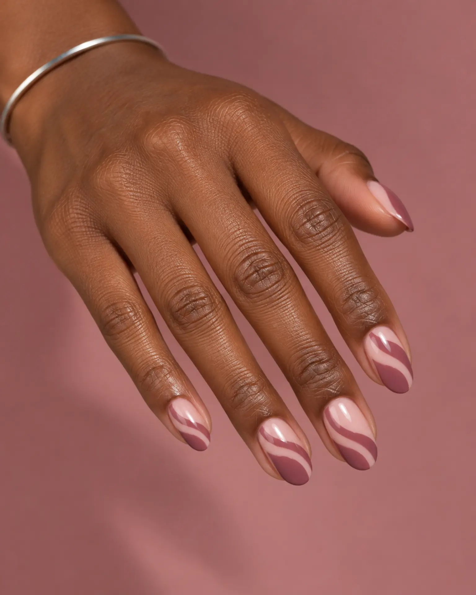 Birthday Negative-Space Curve manicure inspiration for birthday nail ideas