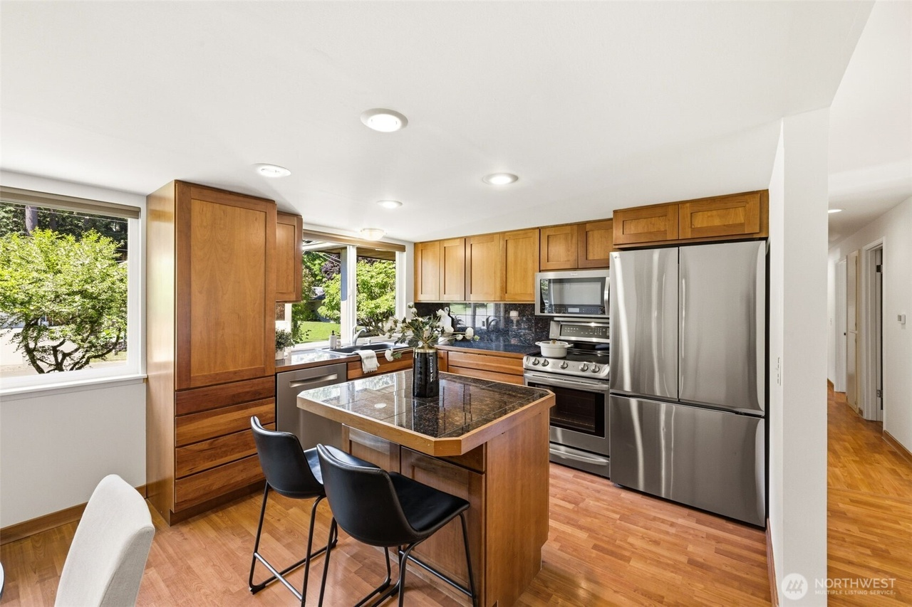 Farmhouse sink and custom pantry kitchen