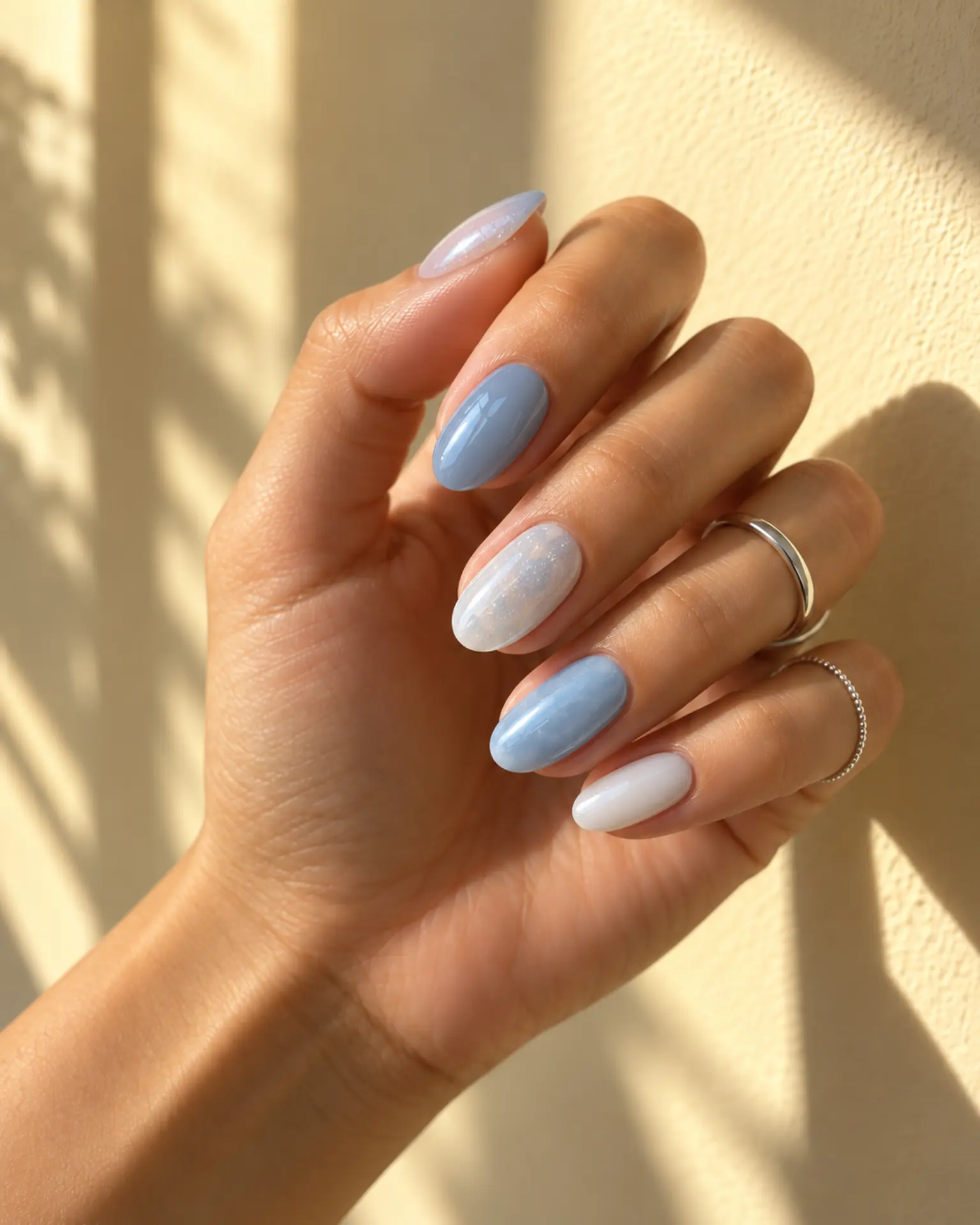 Icy Blue to Milky White Tonal Mix manicure inspiration for winter nail ideas