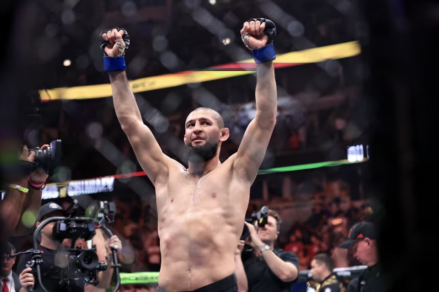 Khamzat Chimaev celebrating in the UFC cage