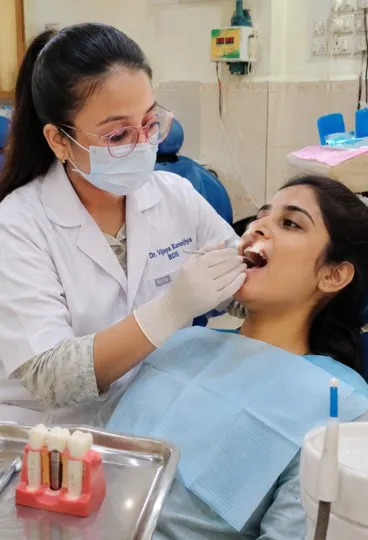 College Girl getting Root Implant Dental Treatment