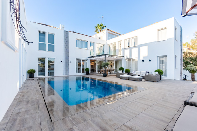 Luxury Mediterranean villa with pool in Marbella, Costa del Sol, prime real estate option for international buyers comparing Marbella vs Estepona property markets.