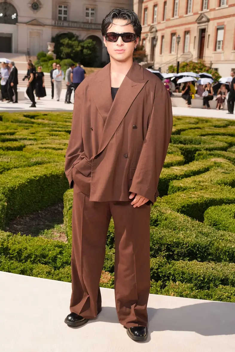 Actor Hudson Williams Battles Heat at Balenciaga Show