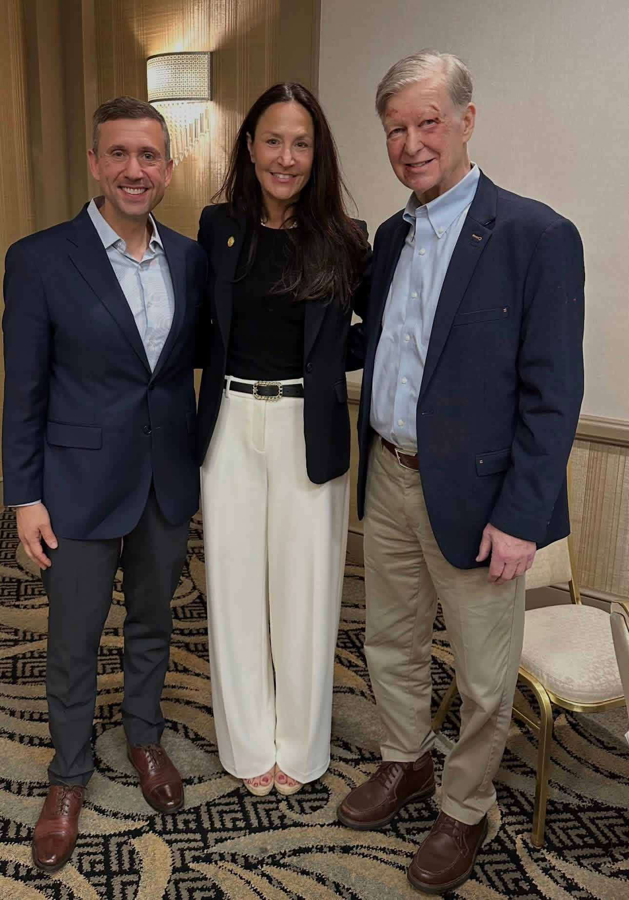 Michelle Milan McFall with fellow Democrats