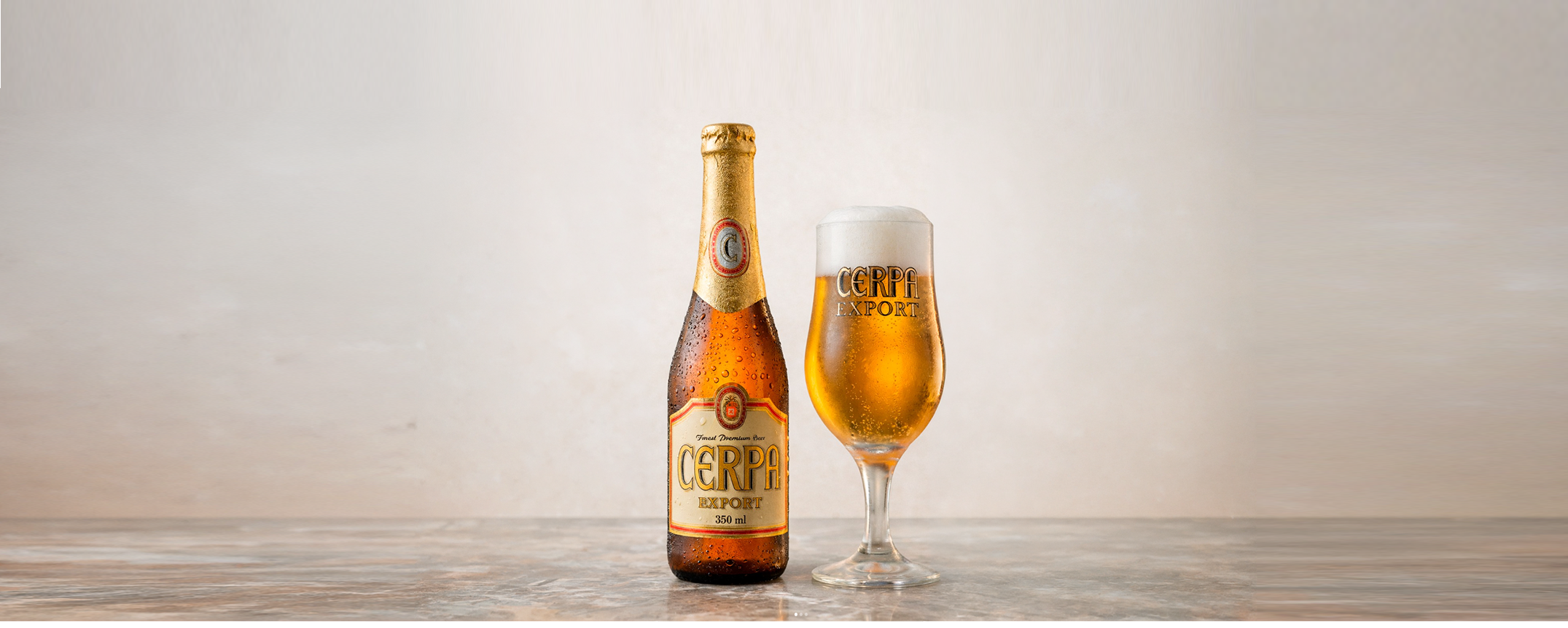 Cerpa Export bottle and glass on marble background