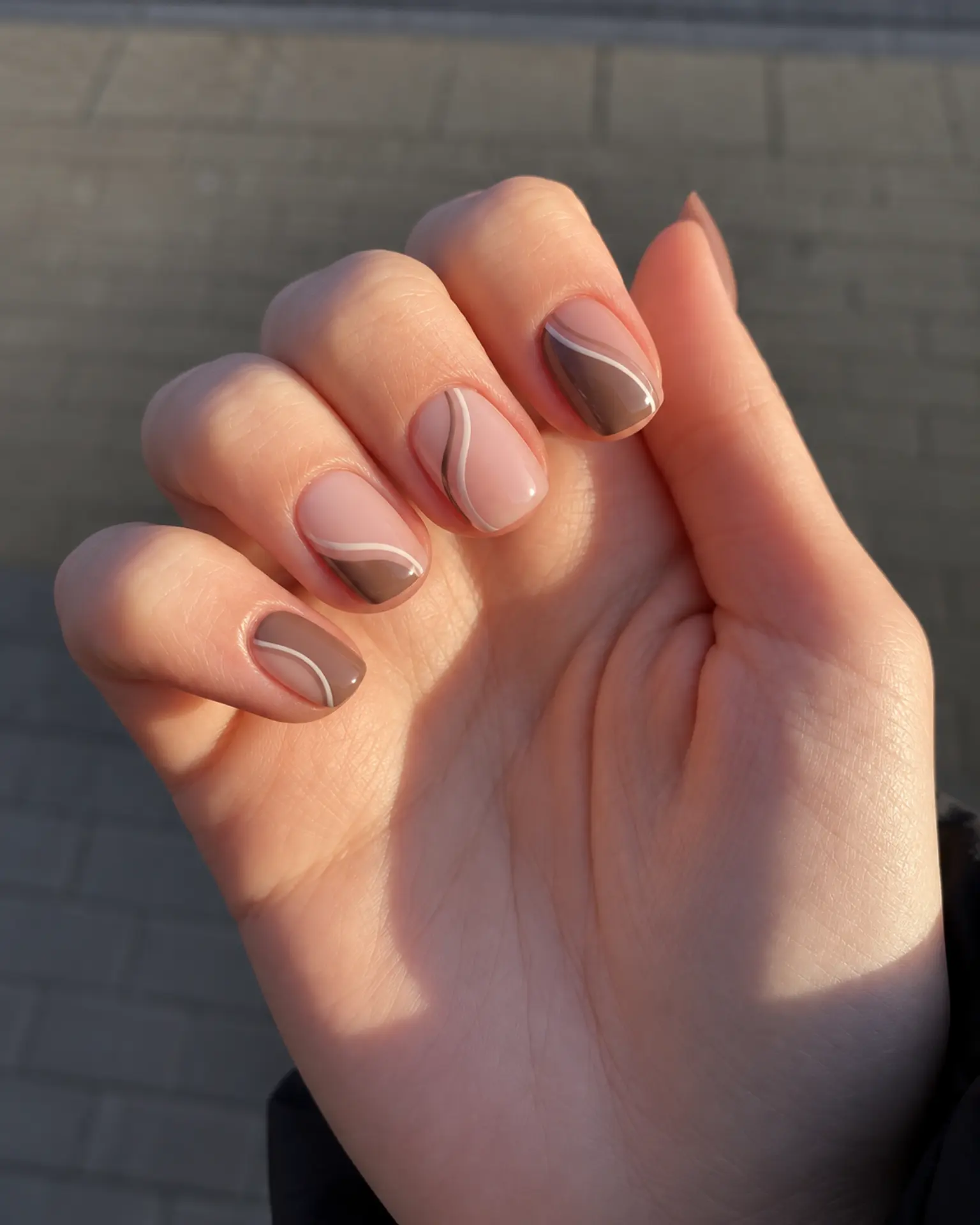 Short Minimalist Negative-Space Curve manicure inspiration for short minimalist nail ideas