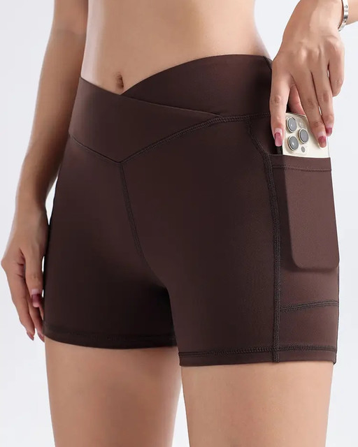 Cross-Waist Biker Shorts with Phone Pocket – High-Waisted Sage Green Shorts, Close-up view